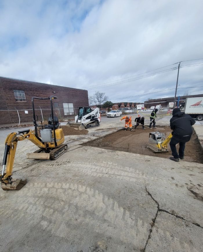 Installation of concrete pad for tractor trailer landing gear.